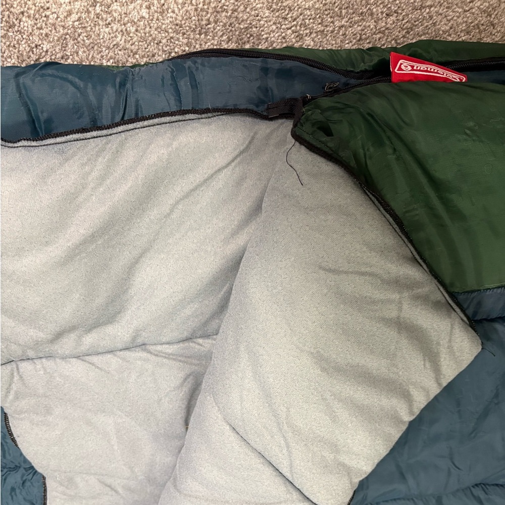 Green and Gray Sleeping Bag
